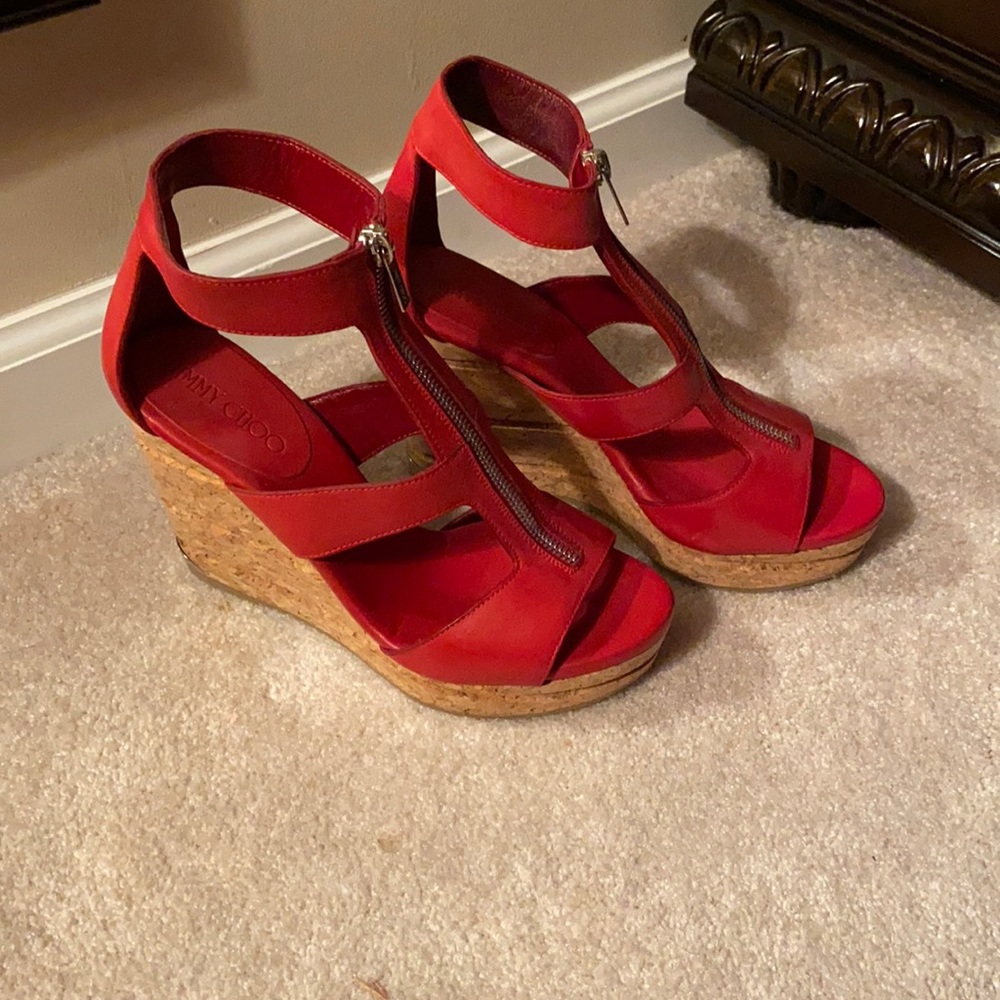 Authentic red jimmy choo wedges. Never worn